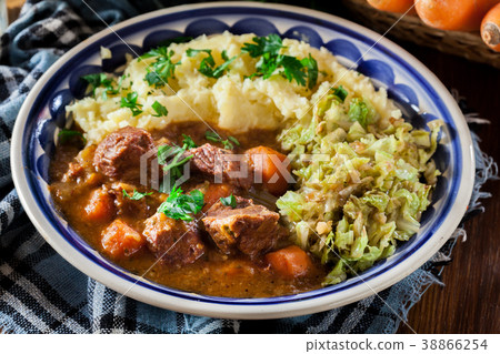 Traditional irish stew served with potatoes Traditional irish stew served with potatoes 38866254