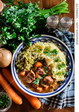 Traditional irish stew served with potatoes Traditional irish stew served with potatoes 38866259