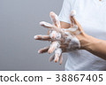 Gesture of a woman hand washing her hands on step 3 38867405