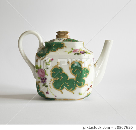 Vintage porcelain teapot isolated on white 38867650