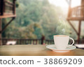 Coffee espresso on wood table nature background 38869209