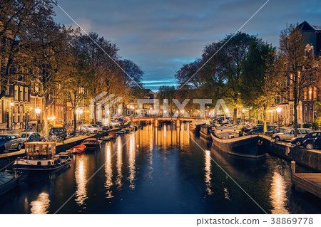 Amterdam canal, bridge and medieval houses in the 38869778
