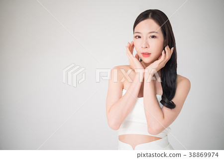 Beautiful asian woman with facial care concept 38869974