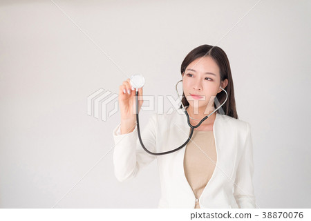 Asian woman female doctor holding sthetoscope 38870076