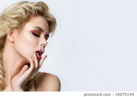 Portrait of young beautiful blonde woman Portrait of young beautiful blonde woman 38870140