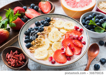 Smoothie bowl with strawberry, banana, blueberry 38870816