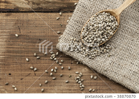 cannabis seeds in a wooden spoon cannabis seeds in a wooden spoon 38870870