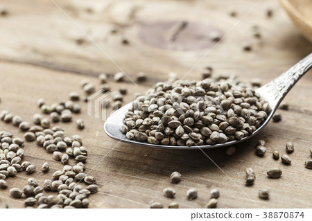 hemp seeds in a metal spoon hemp seeds in a metal spoon 38870874