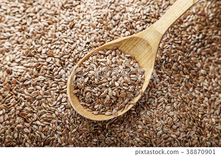 Flax seeds scattered Flax seeds scattered 38870901