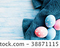 Pastel color Easter eggs on rustic background 38871115