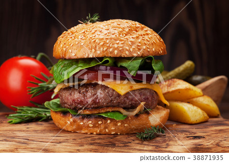 Tasty grilled home made burger 38871935