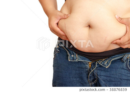 Woman trying to wear jeans. Woman trying to wear jeans. 38876839