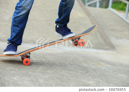 skateboarder legs skateboarding on skatepark ramp 38876955