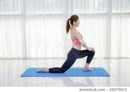 Healthy lifestyle - beautiful female fitness, doing yoga exercises and relax. Healthy eating and managing for healthy lifestyle. Concept photography. 105 38878023