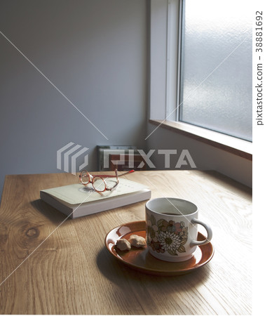 Afternoon tea time books and glasses 38881692