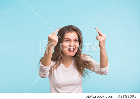 Angry aggressive woman with ferocious expression 38883093