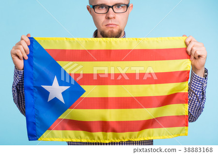 Man with pro-independence flag. Referendum For The 38883168