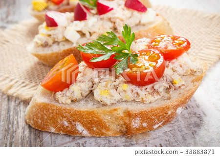 Crusty sandwiches with mackerel or tuna fish paste 38883871