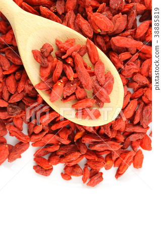 dried goji berries on a wooden spoon dried goji berries on a wooden spoon 38885819