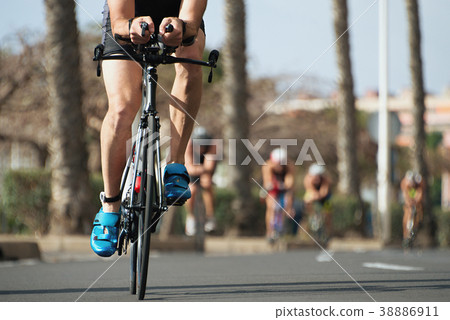 Cycling competition,cyclist athletes riding a race 38886911