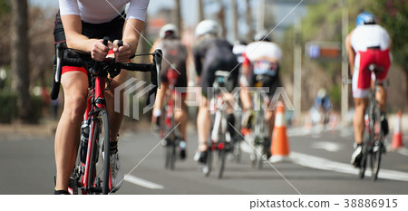 Cycling competition,cyclist athletes riding a race 38886915