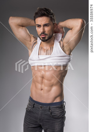 Grave tendinous man undressing himself 38886974