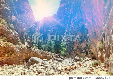 Sun is shining through the edge of canyon Sun is shining through the edge of canyon 38887177