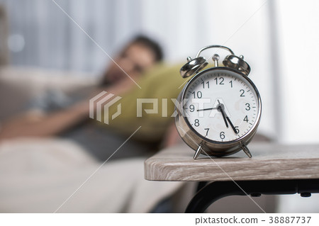 Peaceful male sleeping at home Peaceful male sleeping at home 38887737
