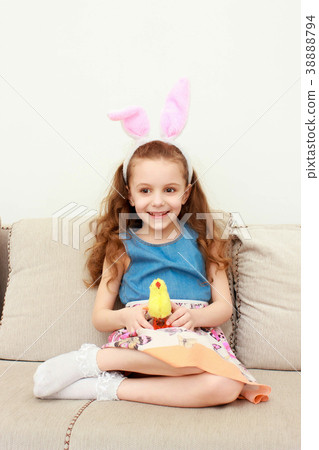 Cute little girl with bunny ears and cuddly toy Cute little girl with bunny ears and cuddly toy 38888794