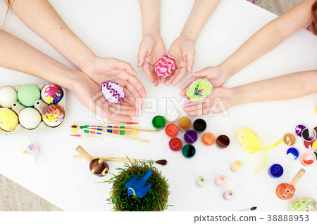 Happy family preparing for Easter 38888953