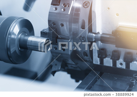 The CNC lathe machine The CNC lathe machine 38889924