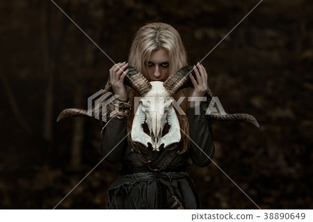Witch in a long black dress Witch in a long black dress 38890649