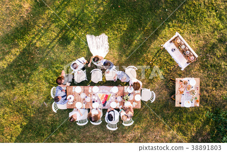Wedding reception outside in the backyard. Wedding reception outside in the backyard. 38891803