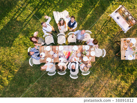 Wedding reception outside in the backyard. 38891812