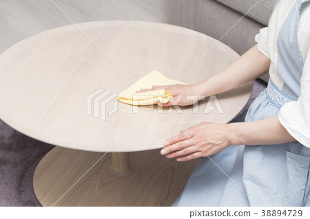 Housewife with a table 38894729