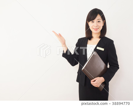 Business woman giving a right hand Business woman giving a right hand 38894770