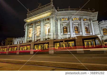 Night shot of tram at Burgtheater Vienna 38895282