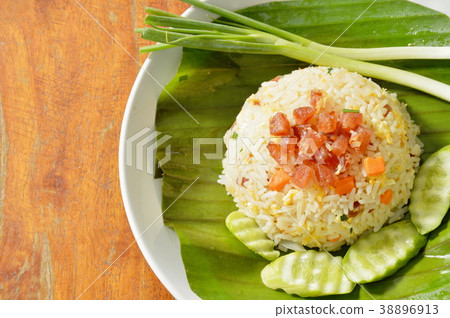 fried rice with chop Chinese sausage on leaf fried rice with chop Chinese sausage on leaf 38896913