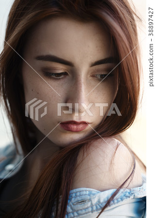 sad young woman 38897427