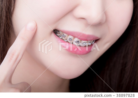 woman touch her face woman touch her face 38897828