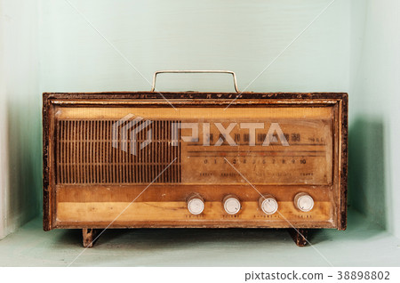 Antique vintage radio pastel colour background 38898802