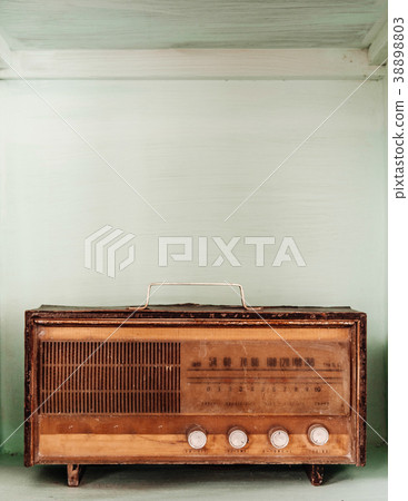 Antique vintage radio pastel colour background Antique vintage radio pastel colour background 38898803