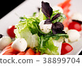 Dish mix of salad with tomatoes and mozzarella 38899704