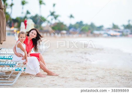 Beautiful mother and daughter at Caribbean beach 38899869