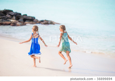 Little happy kids have a lot of fun at tropical 38899894