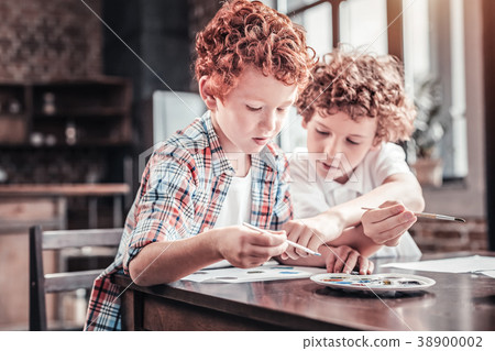 Delighted cute boys expressing their creativity Delighted cute boys expressing their creativity 38900002