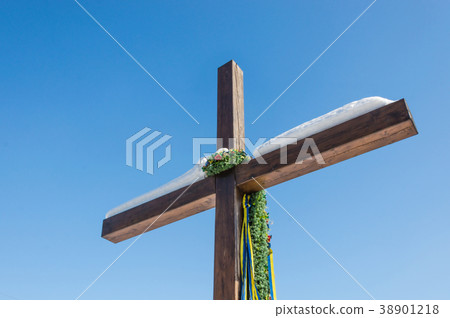 Christian crossblue sky background Christian crossblue sky background 38901218