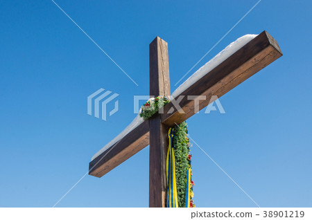 Christian crossblue sky background 38901219