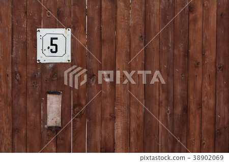 number of street address with a wooden wall 38902069