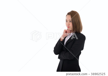 Woman in a business suit thinking Woman in a business suit thinking 38902525